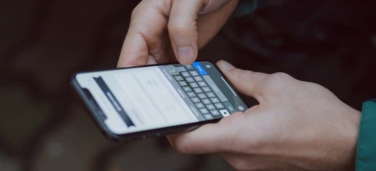 A person typing on their home